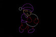 Red and purple LED light display of a boy carrying a white snowball