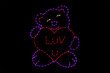 Bear holding a hear that says Luv U outdoor decoration