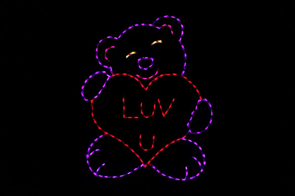 Bear holding a hear that says Luv U outdoor decoration