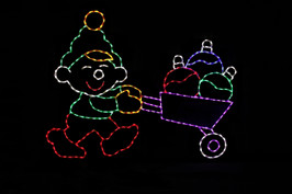 Elf rolling a wheelbarrow of ornaments, outdoor LED wireframe Christmas decoration.