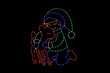 An LED light Christmas wireframe decoration depicting a young boy hugging a baby deer. 