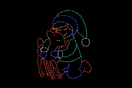 An LED light Christmas wireframe decoration depicting a young boy hugging a baby deer. 