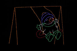 An LED light wireframe Christmas decoration depicting a snowman swinging on a swing set.