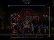 Scaled image of an animated ghost mansion light display. Dimensions are 11' 6" by 10' 6".