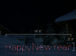 Scaled image of a Happy New Year light display.