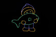 Light display of a boy holding a fish.