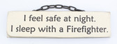 I feel safe at night. I sleep with a Firefighter. - Novelty Plaque