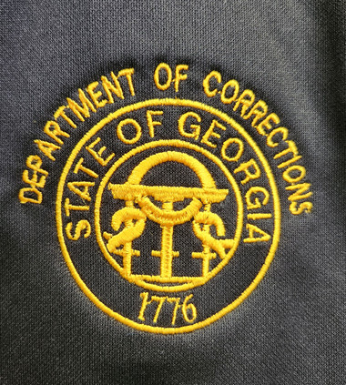 Black Polo with Gold Seal