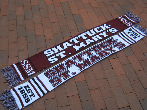 Show your school spirit with a fringed SSM scarf!  64 inches long, approx. 7.5 inches wide, and it's made of 100% acrylic yarn. Black, white and maroon with SSM logo.