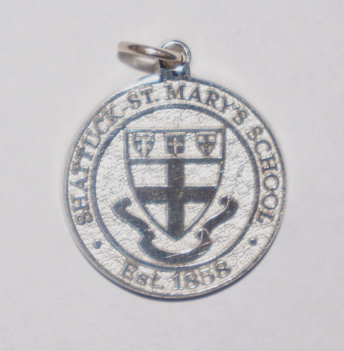 Sterling silver charm featuring Shattuck - St. Mary's Shield.  5/8 inch round.  Nice addition to your collection.
