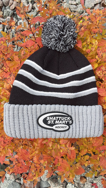 100% acrylic construction is lightweight, soft and warm with a wool-like feel.  Custom hockey patch and the three-stripe design and pom add some complementary color to this on-trend style.