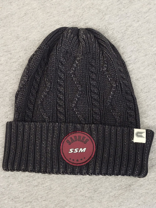 SSM’s Affirmative washed rib beanie features a circular, woven patch on the cuff.
- Washed distressing, 100% cotton, available in black.
