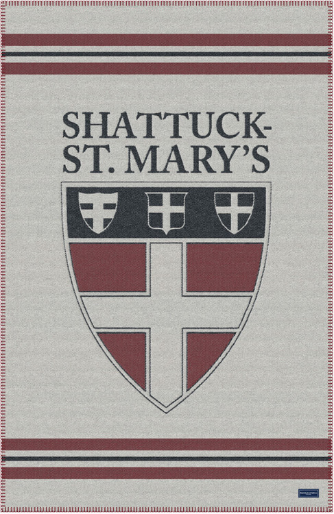 Just as the days and nights are getting cooler you can snuggle up in this custom throw from Faribo Mills featuring the Shattuck - St. Mary's Shield.  Jacquard Design  85% Wool / 15% Cotton.  Dimension 42” x 65”
