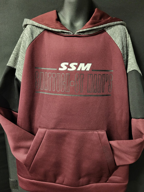 For an extra layer when the temperatures drop, wear the Colosseum Shattuck - St. Mary's Hardcore Hoodie. With SSM colors and graphics, you’ll be able to show off your team pride throughout the entire season and year. Made with soft fabric, you’ll stay comfortable throughout the whole game in your SSM Hardcore Hoodie. Screen print logos, hood, front pouch pocket, 100% polyester. 