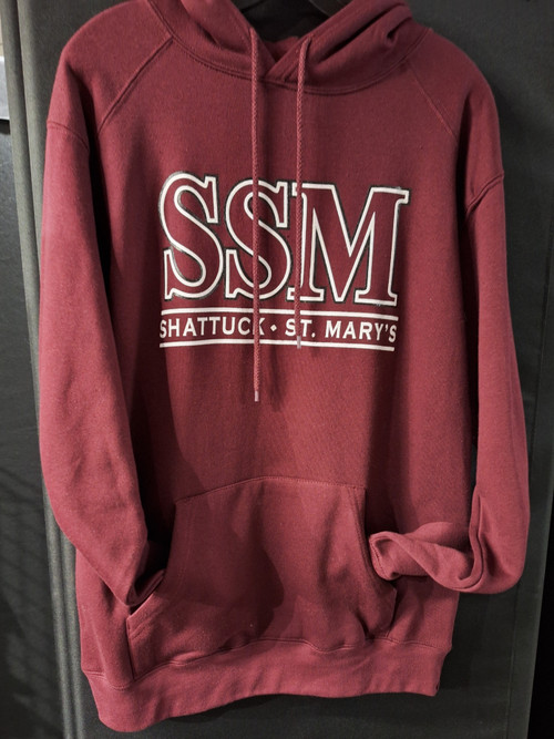 SSM Shattuck-St. Mary's logo hooded maroon sweatshirt.