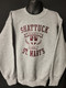 Simple, cozy and slightly Retro, this crewneck sweatshirt is a favorite on campus.  Screened logo, 50/50 blend, ribbed cuffs.