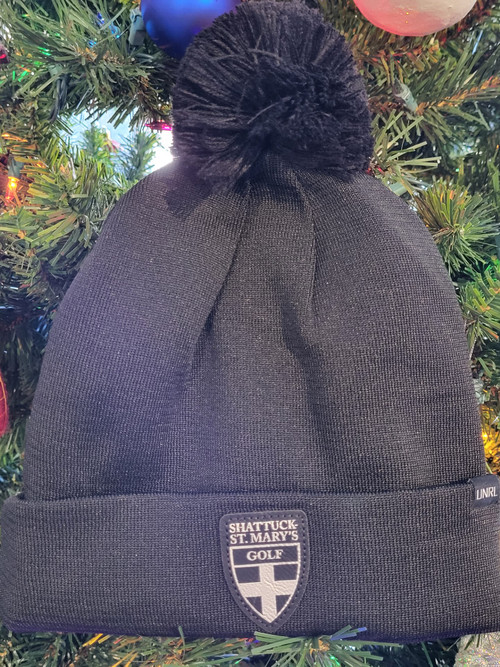 Black UNRL beanie with leather Golf Shield patch. Warmer and more versatile than any other winter knit we've seen. Made with a detachable pom and HexHeat liner.