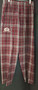 Men's SSM Arch Logo flannel pajama pants feature SSM's famous Arch Logo in white embroidery on the front. Pants are SSM's school colors of maroon, black and white plaid. PJ pants have a drawstring waist. Made of 100% cotton. Available in Men's sizes Small, Medium and Large. 