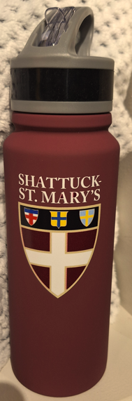 Maroon stainless steel flip top water bottle. Bottle features Shattuck-St. Mary's shield on the front. Holds up to 25oz.