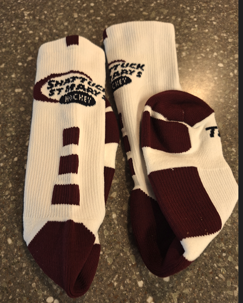 Maroon and white athletic crew socks featuring our very own Shattuck-St. Mary's Hockey Swoosh Logo. Available in Adult size Medium and Large.