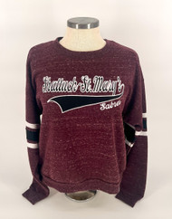 Get ready to show your school spirit with this women's ultra soft loose fit Crewneck cropped sweatshirt. Features Ribbed cuffs and band. Shattuck-St. Mary's Sabres on front with black and white stripes on sleeves. 95% polyester/5% cotton. Available in women's sizes small, medium, large, X-large and XX-Large.