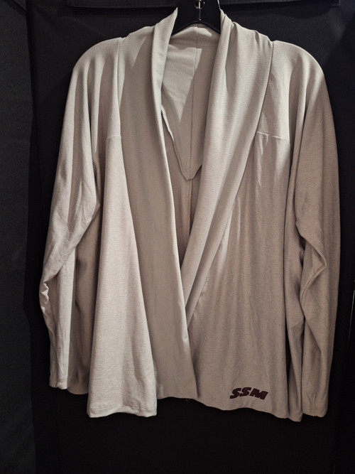 Add an extra layer with style with our Women's Diamonds Knit Cardigan. Ultra soft gray waterfall cardigan featuring SSM in maroon screen print on bottom left side. 88% polyester/12% spandex. Women's sizes small, medium, and large.