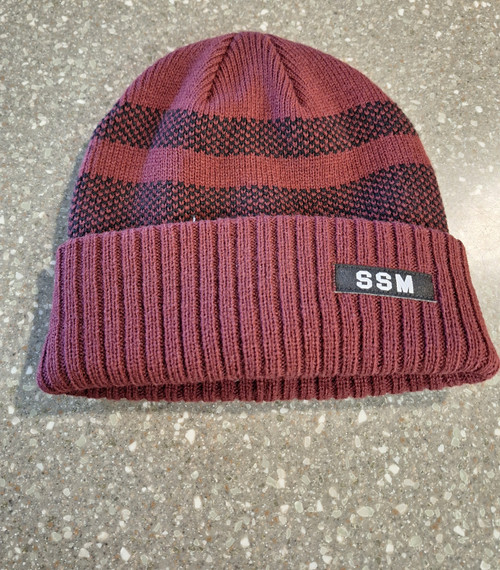 Knit cuffed beanie in maroon with black stripes. Featuring woven SSM label on front. One size fits all.