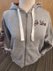 Super cute soft gray women's fleece zip up hoodie. Features maroon lined hood with hockey lace strings. Go Sabres screenprint on upper left chest, Shattuck-St. Mary's on right sleeve and SSM on left sleeve. Sabres on back of hood. 55% cotton, 45% polyester. Hood lining 100% Cotton.