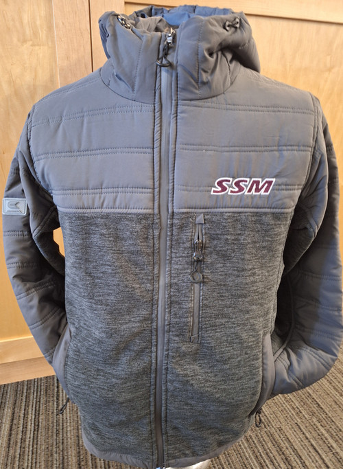 Keep warm in this men's hooded puffer jacket. Gray with maroon embroidered SSM on front left chest and Shattuck-St. Mary's on upper right shoulder. Features 3 zippered front pockets.100% polyester.