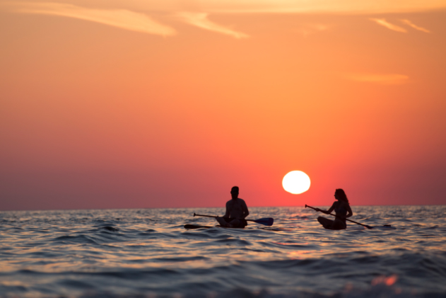 sunset paddle board celebration