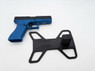A blue and black pistol sitting next to an empty Black GBB Pistol Display Stand - Glock & Hi-Capa on white.