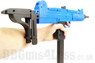 Hand holding the Well D91 UZI Replica Electric BB Gun with Folding Stock in Blue by the grip