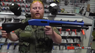 guy with dboy 003a pump action shotgun with full stock in blue 