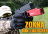 Guy with Zoxna Gas Powered Mini Launcher in Red