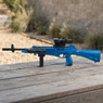 The Vigor 8910B Beretta Cx4 Storm Replica in Blue resting on a wooden table. The Vigor 8910B Beretta Cx4 Storm Replica in Blue resting on a wooden table.