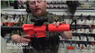 Guy with Well D2804 Electric Airsoft gun in orange