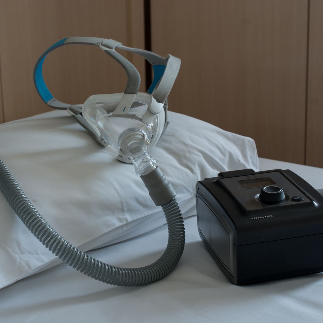 cpap machine resting on a pillow