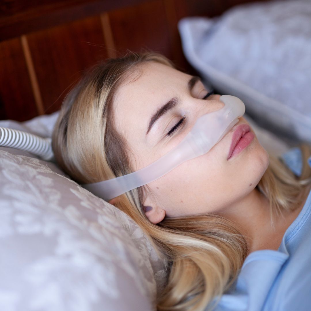 person wearing cpap breathing machine