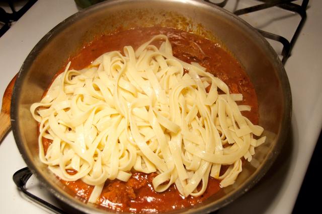 pasta added to meat sauce