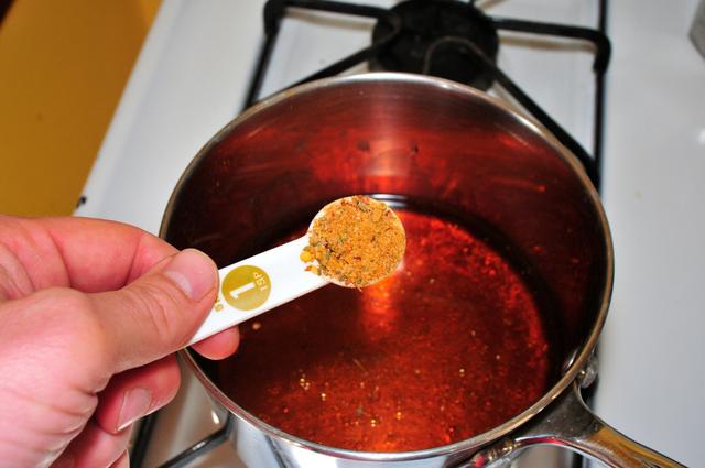 sauce pan of olive oil vinegar and italiano pronto seasonings