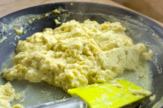 scrambled soft eggs in a saute pan