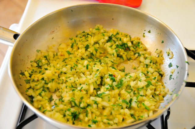 onions and parsley with all natural italian seasonings sauteed in a hot pan