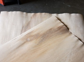 Due the nature of the material, the short edge is wavy (see image).