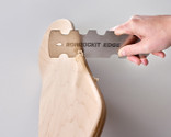 The specially shaped woodworker's scraper is ideal for cleaning up a shaped edge in a flash! 