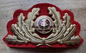 om238 - original NVA Army & Stasi MfS visor hat cap badge
