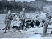 aa533 - Wehrmacht soldiers surround shot down allied aircraft photo