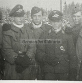 aa594 - Luftwaffe Pilots in flight suits & with pilot badge
