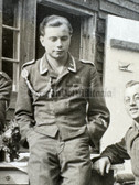 aa675 - Luftwaffe soldiers at barracks hut - Unteroffizier with shooting lanyard and medal ribbons - dated 1940
