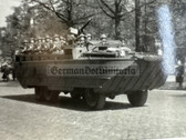 aa822 - two photos - NVA parade with large amphibious troop carrier