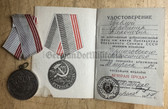 om181 - c1987 Soviet Medal Veteran of Labour with award cert booklet